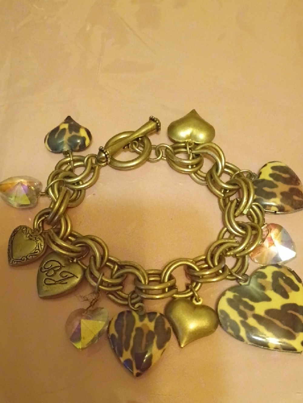 Betsey Johnson Gold-Tone Heart Charm Bracelet with Leopard-Print Hearts